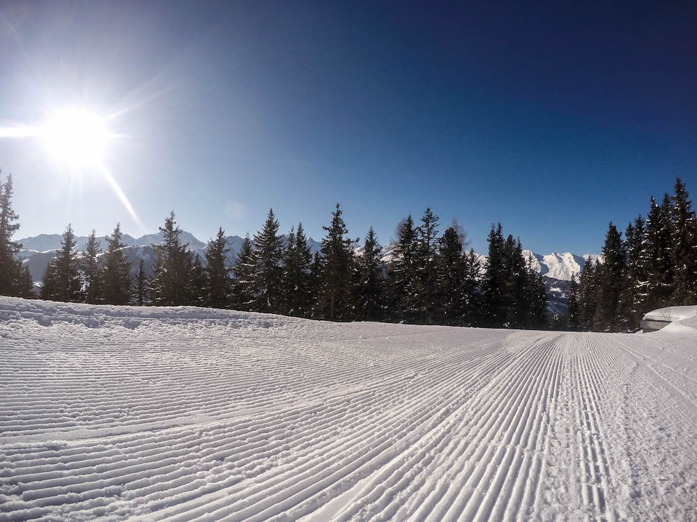 zon piste skilift sneeuw